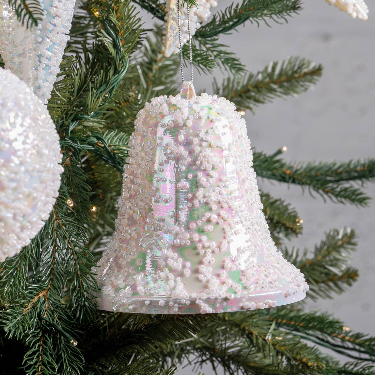 7" White Iridescent Bell Ornament With Clear Bead Details
