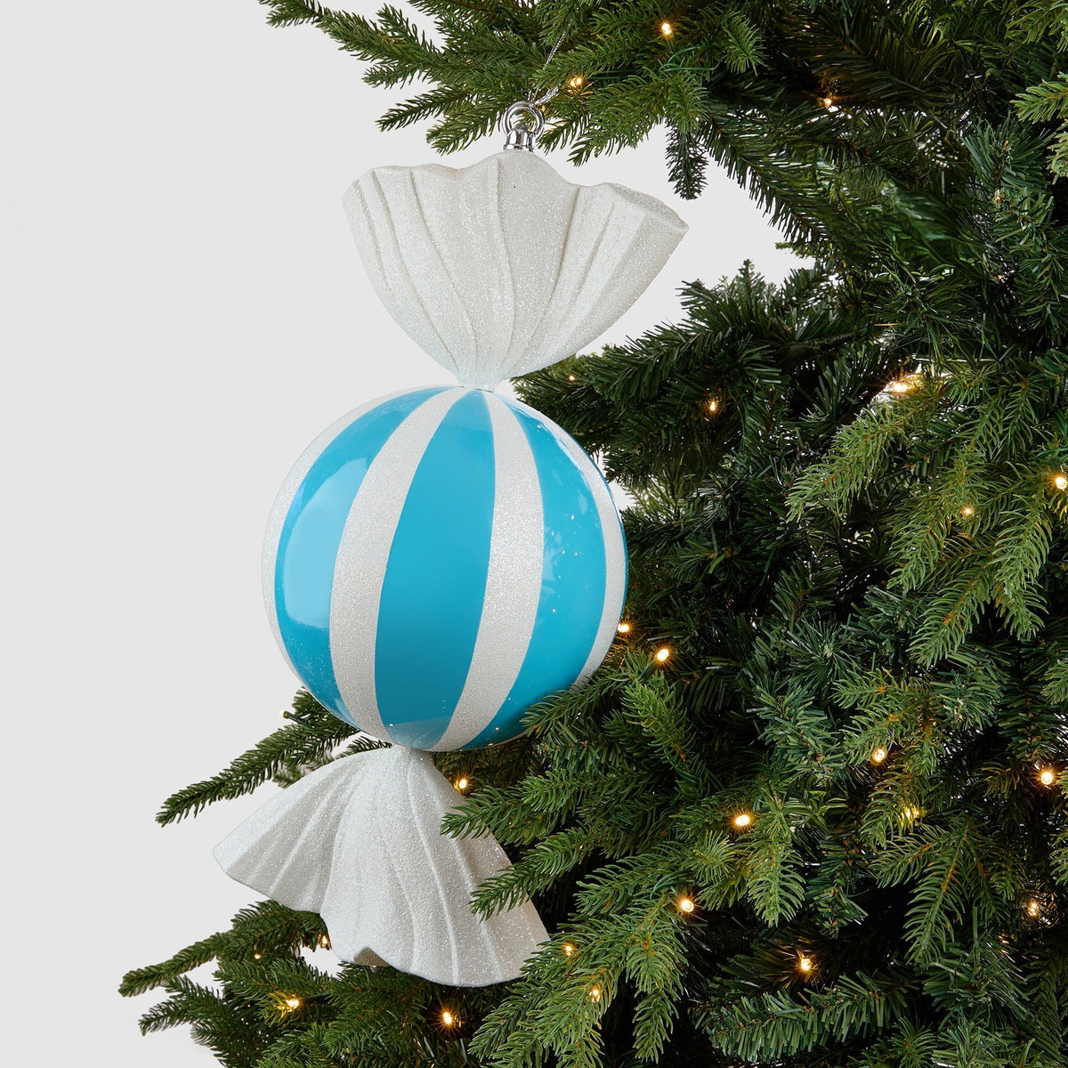 Blue Candy Ornament With White Stripes