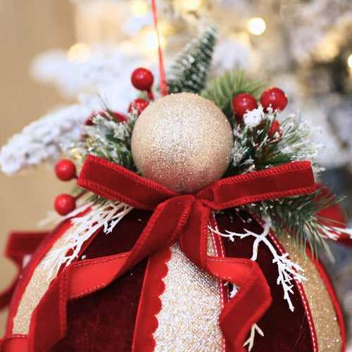 Burgundy & Champagne Ball Ornament With Bow & Foliage