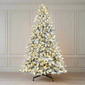 Joy By 8.5' Flocked Christmas tree with 900 Warm White LED Lights