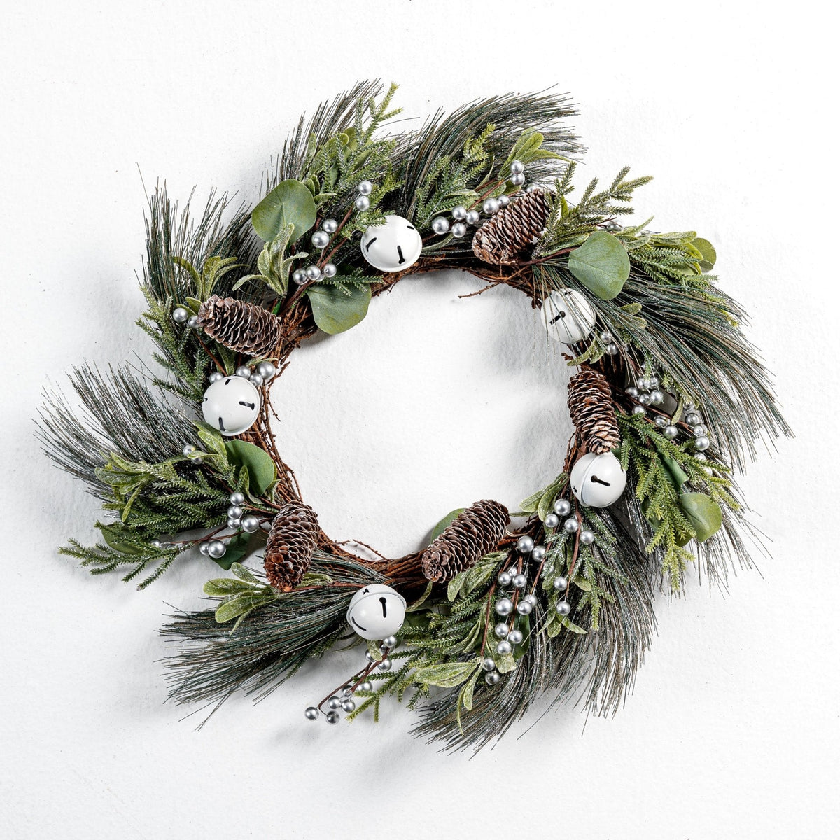 Pine wreath with white bell and pinecone