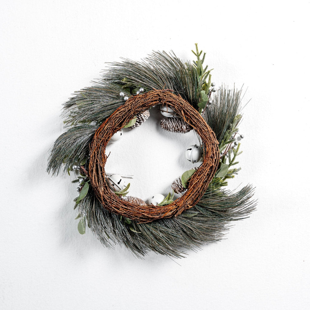 Pine wreath with white bell and pinecone