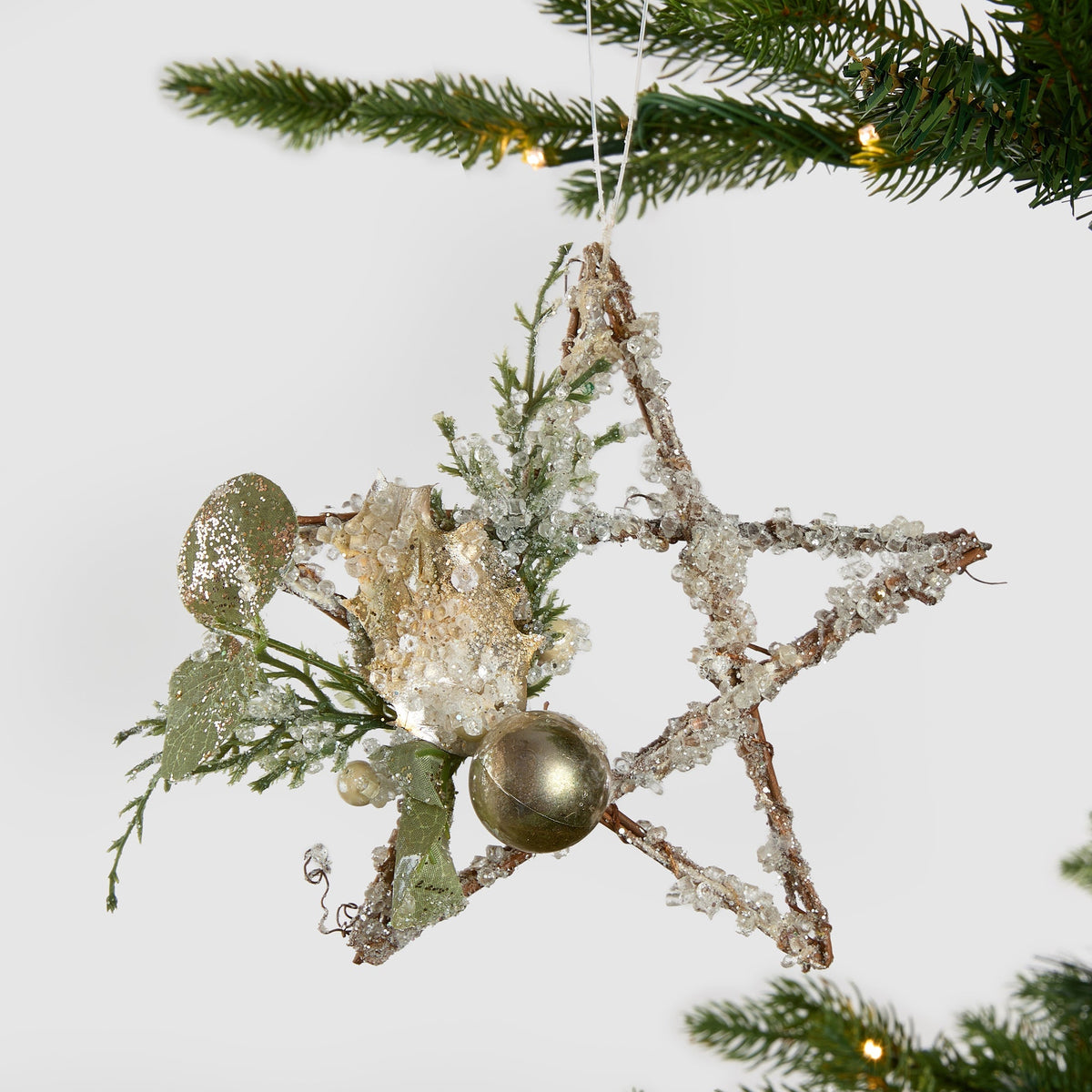 Rustic Snow Flocked Star With Foliage